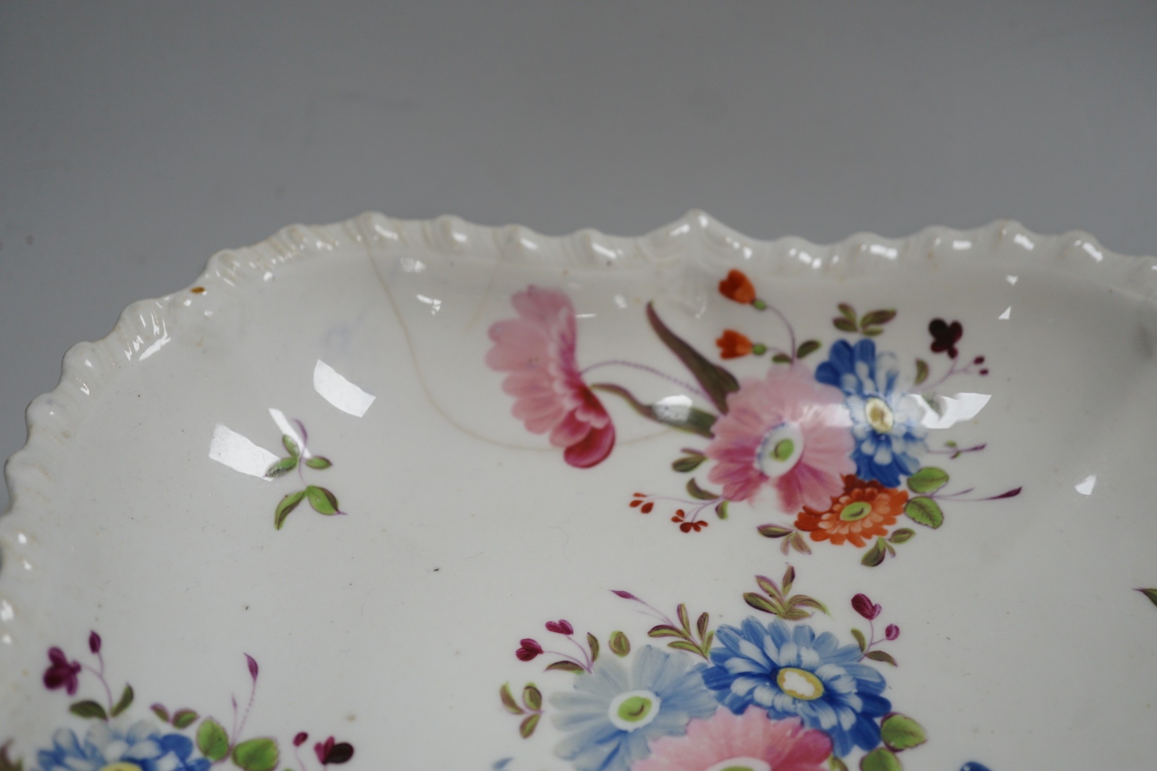 An English porcelain two handled pierced pedestal dish, c.1840 and 19th century English tea and dessert wares, dish 35cms wide